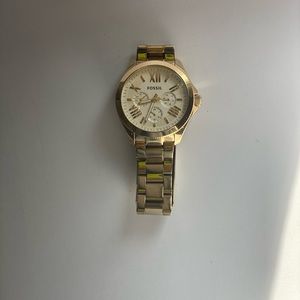 Gold fossil watch
